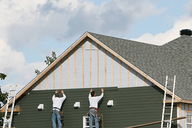 Professional Emergency Siding Repair technician working in Long Beach, IN